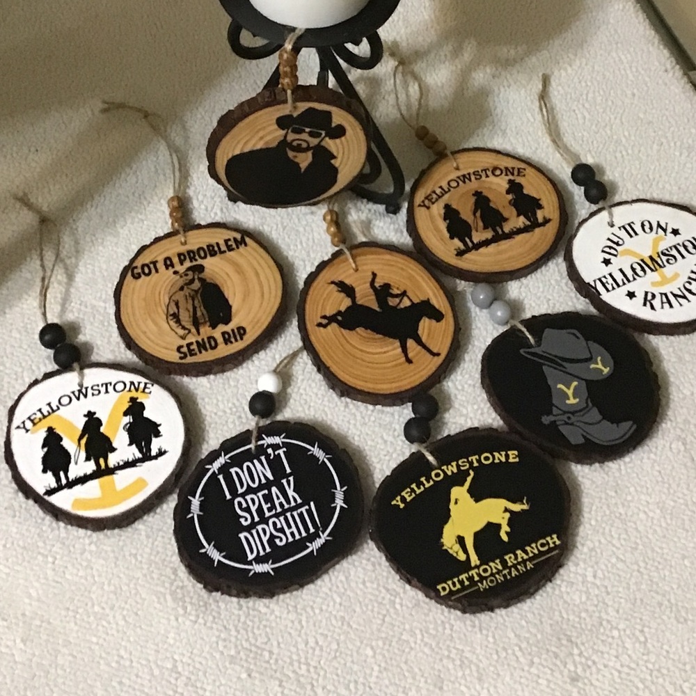 HandmadeYellowstone wood slice ornaments/magnets.Measures 3.5-4’ in diameter.